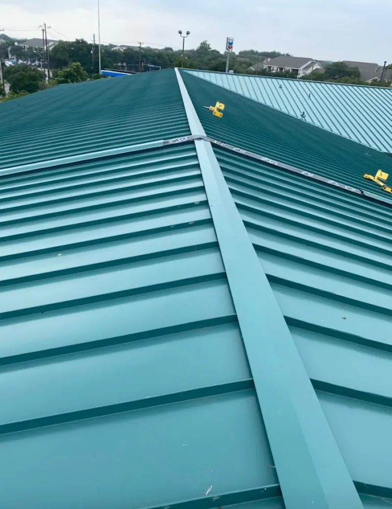 Green commercial metal roof ridge and valley for Metal Roof Repair in Ennis